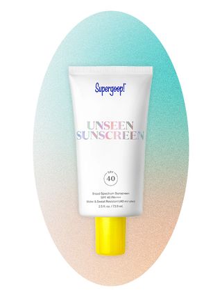 Supergoop sunscreen on an ombre blue and peach background