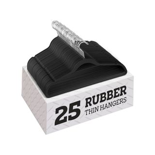 A pile of black rubber hangers on a box that says '25 rubber thin hangers'