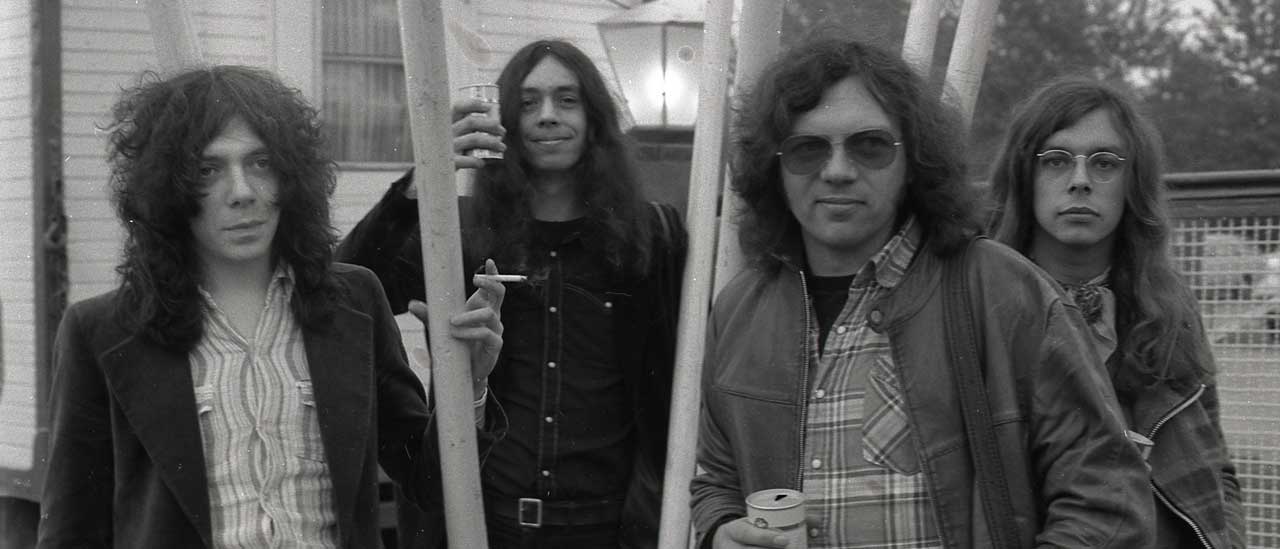 Camel in 1974 posing in front of a circus caravan