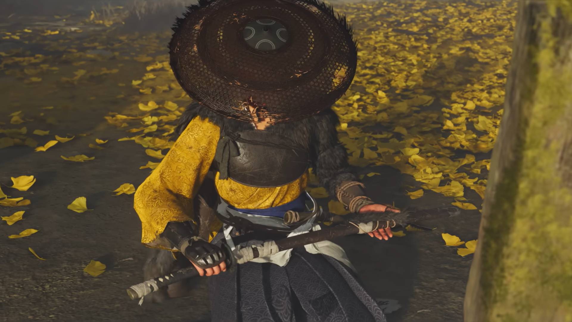 Ghost of Yotei screenshot of Atsu holding a sheathed katana as she kneels on the ground