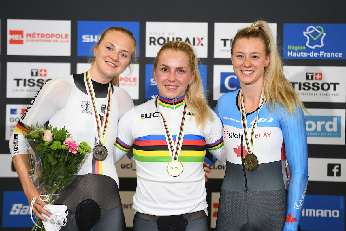 Picture by Simon Wilkinson/SWpix.com - 22/10/2021 - Cycling - Tissot 2021 UCI Track Cycling World Championships - Women's Sprint Finals - Stab Velodrome, Roubaix, France - Podium - Germany's Emma Hinze takes gold and the rainbow jersey after winning the women's sprint final with Lea Friedrich taking silver &amp; Canada's Kelsey Mitchell taking bronze..