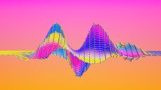 An illustration of a rainbow-colored sine wave with multiple peaks and troughs in front of a pink and orange background