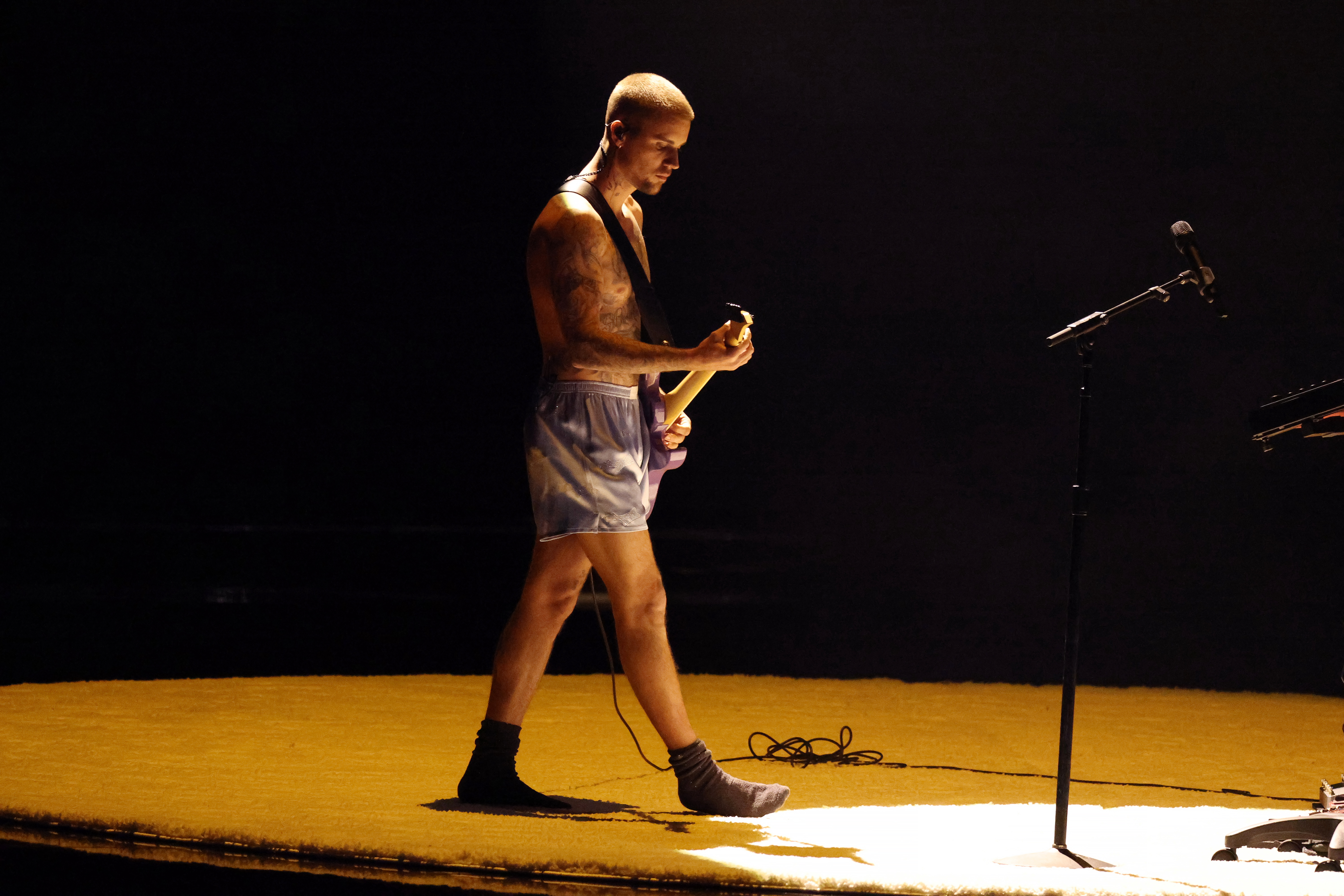 Justin Bieber performed at the 2026 Grammy Awards in the silk shorts trend inspired by Hailey Bieber