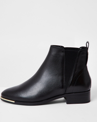 River Island Black Leather Chelsea Boots | $111/£60
A classic staple in anybody's closet, these low black Chelsea boots are perfect for styling with every outfit imaginable— from the most glamorous sequined dress, to an off-duty jeans-and-tee ensemble for the day after the wedding. 