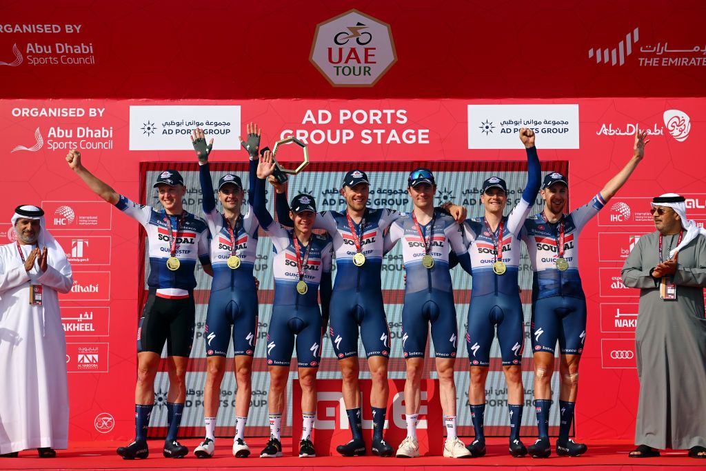 KHALIFA PORT UNITED ARAB EMIRATES FEBRUARY 21 LR Tim Merlier of Belgium Pieter Serry of Belgium Remco Evenepoel of Belgium Bert Van Lerberghe of Belgium Mauro Schmid of Switzerland Louis Vervaeke of Belgium and Josef Cern of Czech Republic and Team Soudal QuickStep celebrating on the podium as the winning team in the time trial during the 5th UAE Tour 2023 Stage 2 a 173km team time trial in Khalifa Port UAETour on February 21 2023 in Khalifa Port United Arab Emirates Photo by Dario BelingheriGetty Images