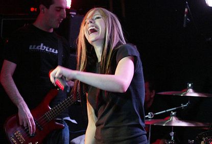 Avril Lavigne laughs off racism claims