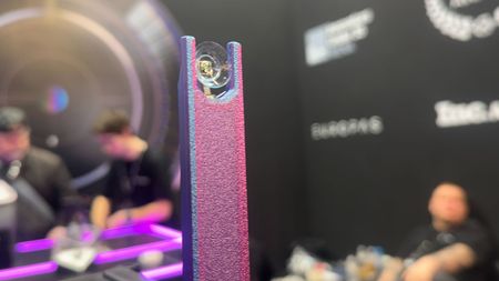 The XPANCEO Biosensing smart contact lens at MWC, displaying on a forked monolith