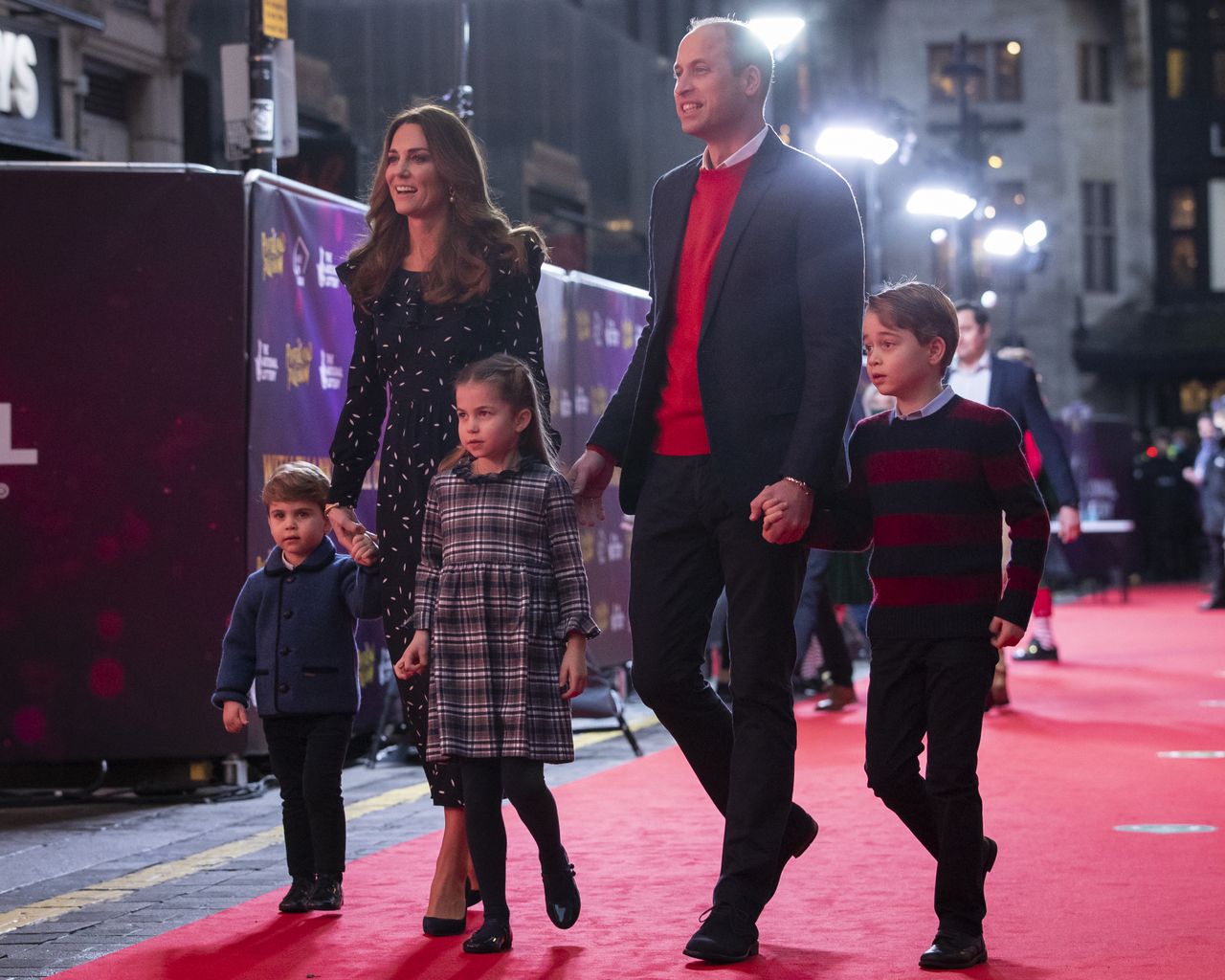 Prince William and Kate Middleton take the young royals to a movie premiere