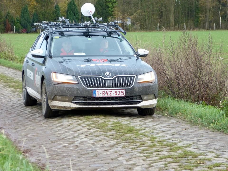 The riders are followed by Dirk Demol and Matt Schriver in the car