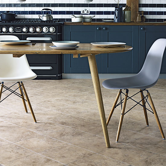 Kitchen with microwave and table with chairs