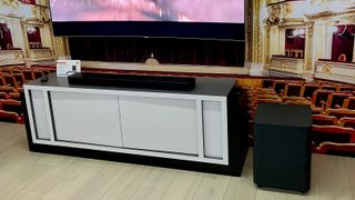 JBL 1300X soundbar on table beneath TV