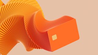 Digitally generated image of orange credit cards. Concept of fintech technology, new banking and cloud technology. Clean design.