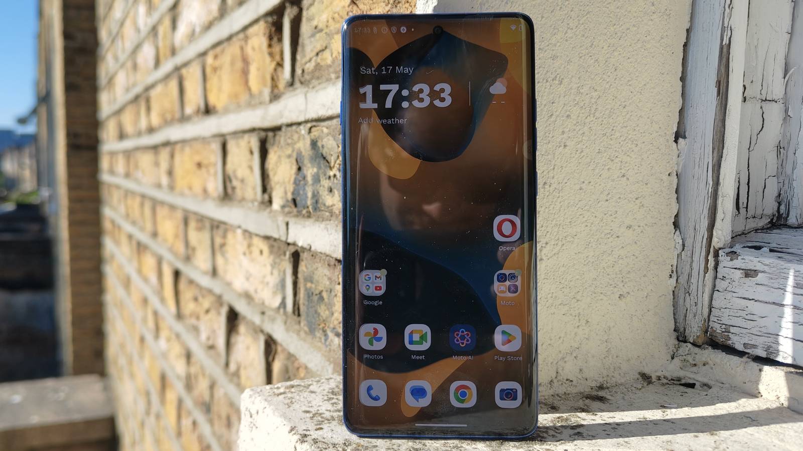 The Motorola Edge 60 Pro on a window sill