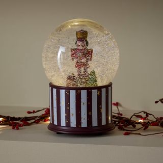 M&S Light Up Musical Nutcracker Snow Globe