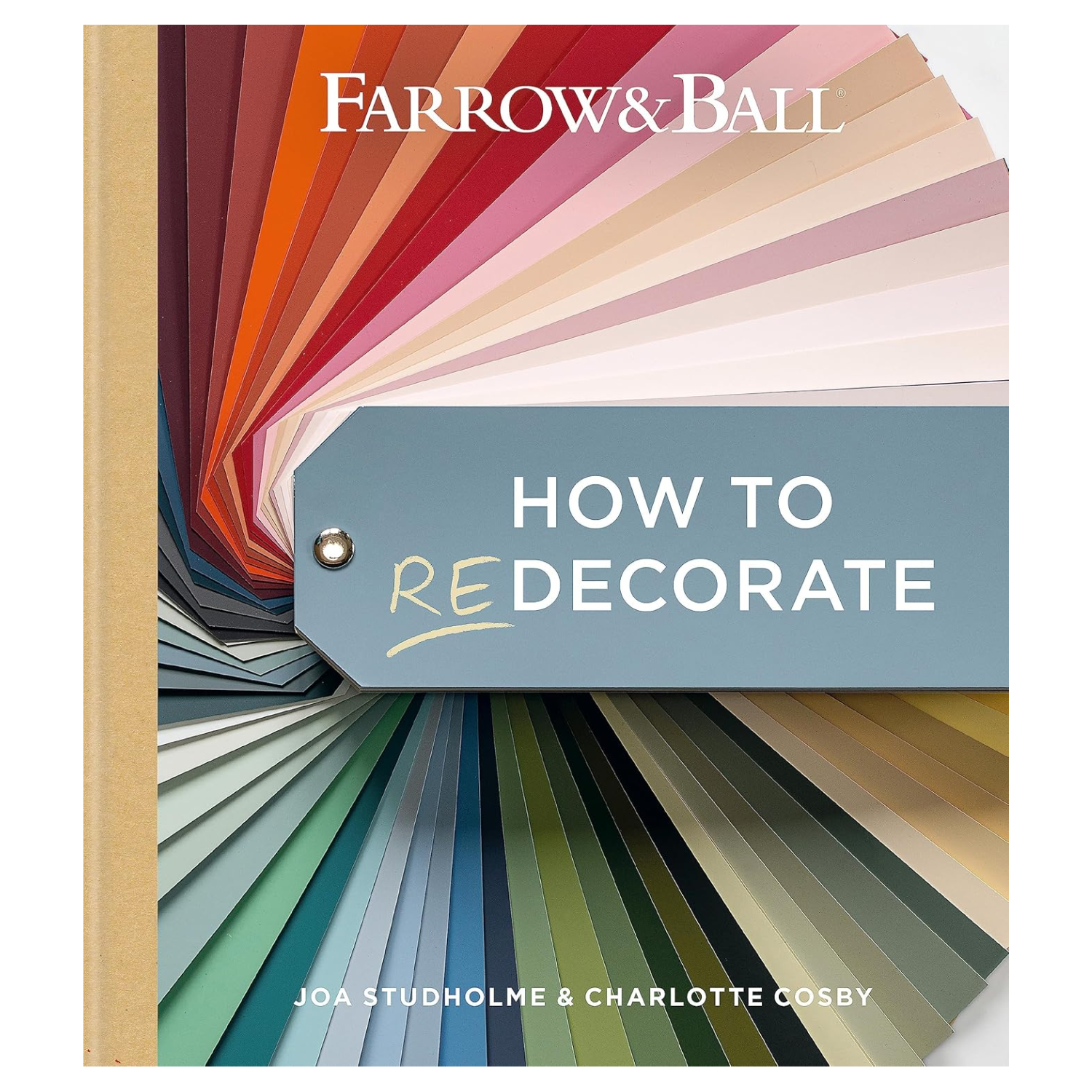 A hardcover book with a gold spine and a front cover featuring a fan of paint swatches
