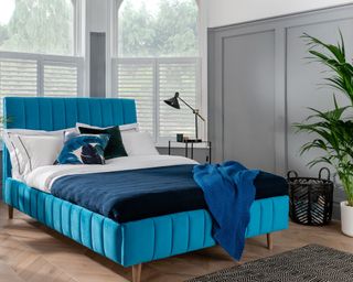 Aquamarine blue bed in boys bedroom by Fishpools