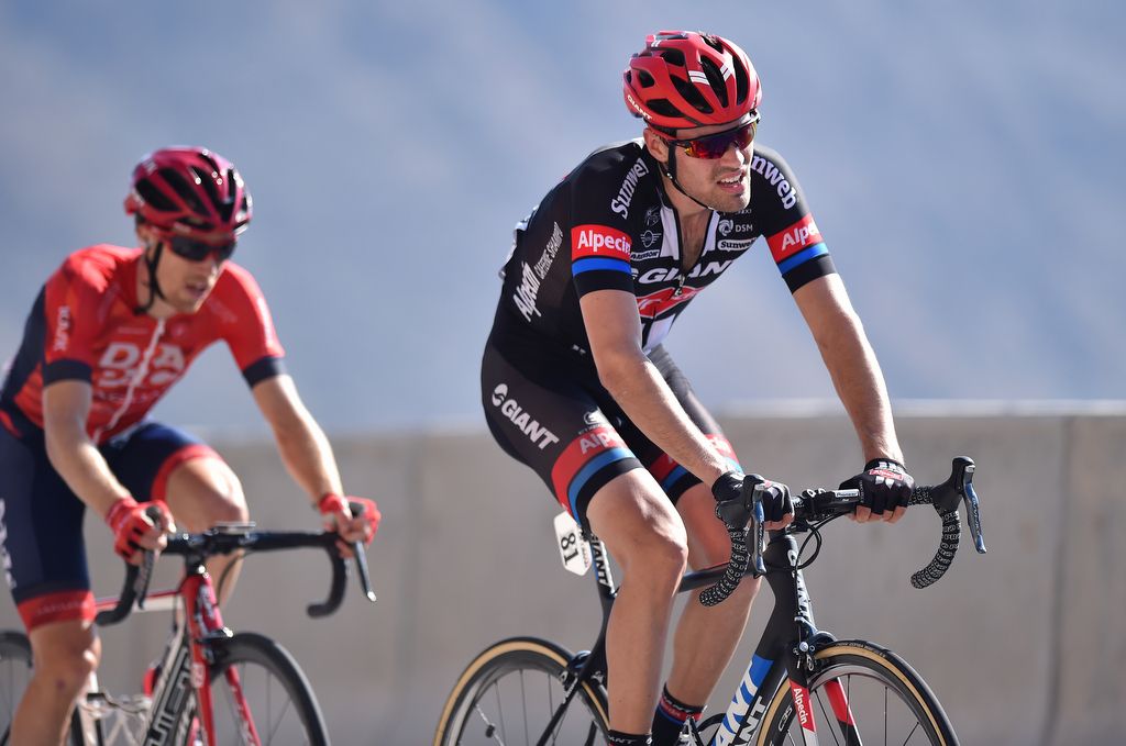 Brendan Canty (Drapac) on the wheel of Tom Dumoulin (Giant-Alpecin) at the Tour of Oman