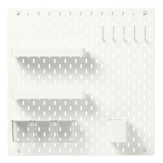 A white pegboard with storage and organization containers built in