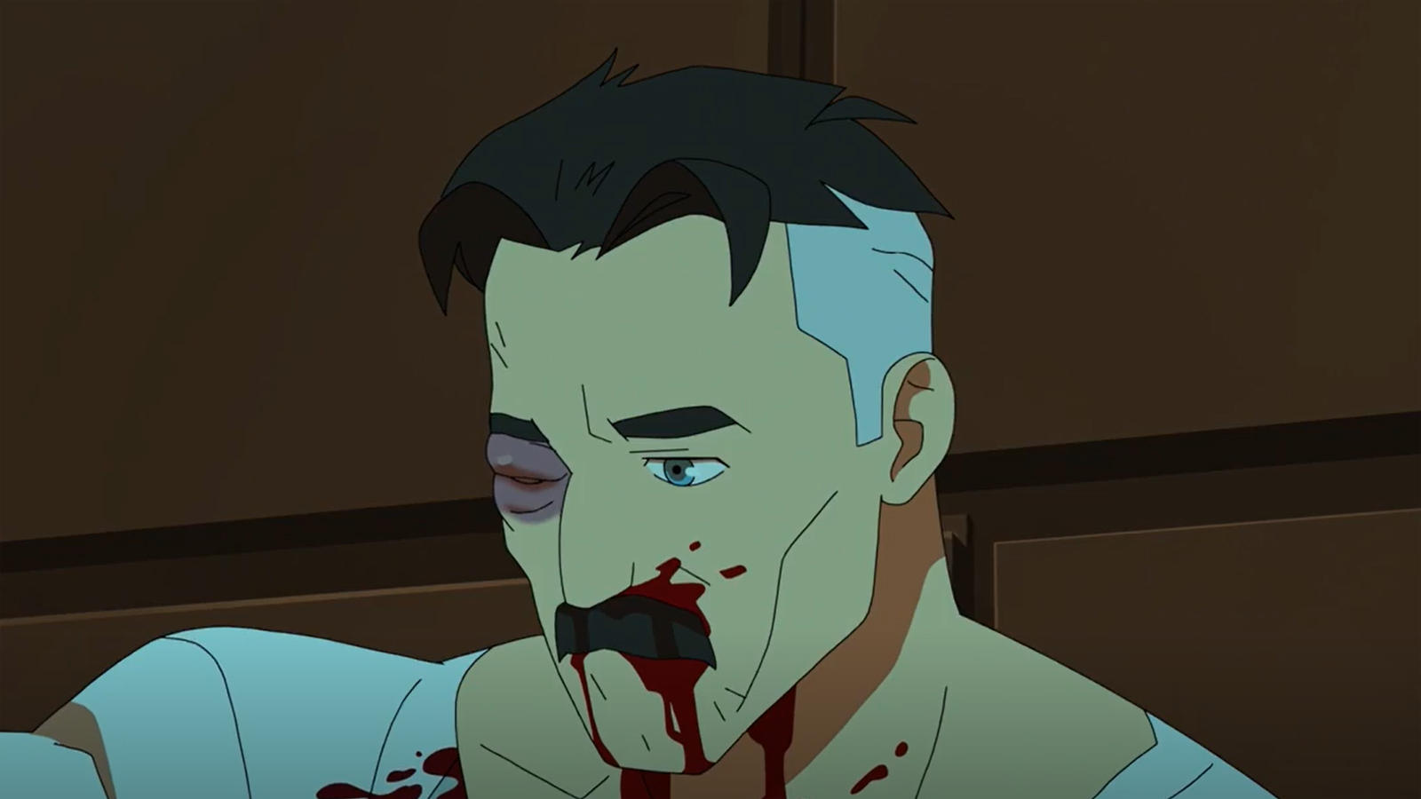 A bloody and forlorn Omni-Man sits in a prison cell in Invincible season 2's finale