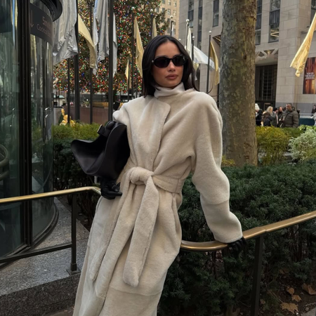 Kelsey Merritt wearing an Almada Label coat