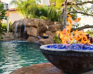 Pool grotto with fire pits