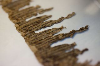 A detail of fragments of the 2000-year-old Dead Sea scrolls at a laboratory before photographing them on December 18, 2012 in Jerusalem, Israel.