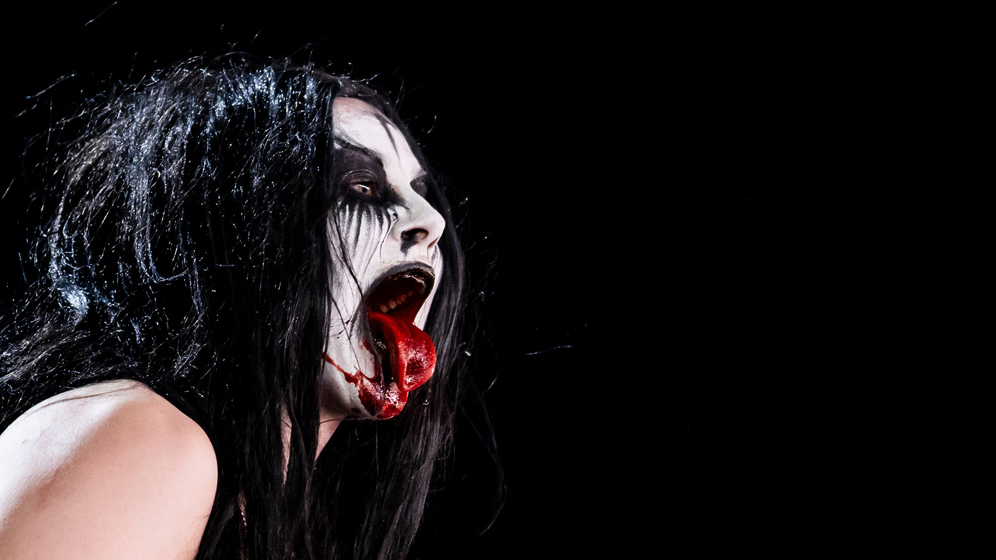 Norwegian black metal group Witch Club Satan perform on stage during the 49th Paleo Festival in Nyon, Switzerland