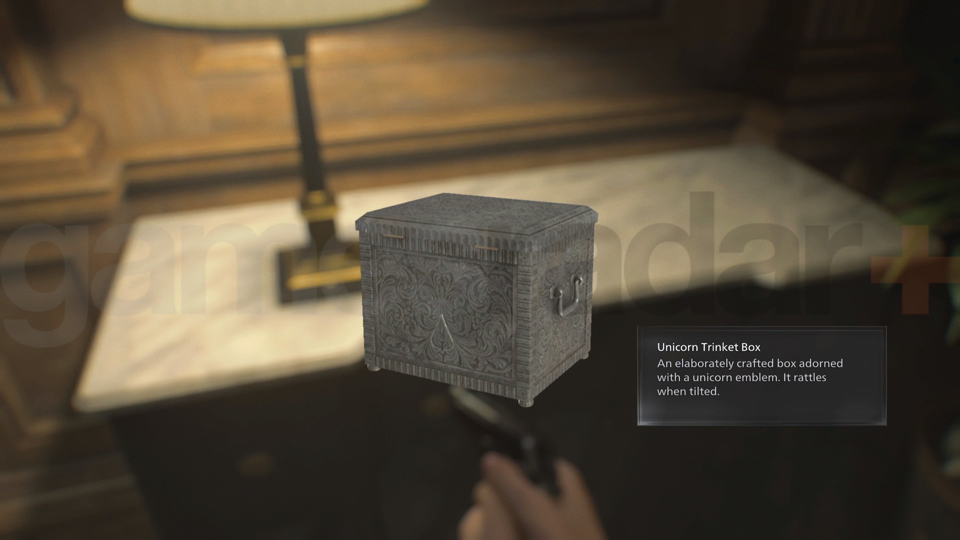 Resident Evil Requiem unicorn door puzzle with the red gem needed to open the palor