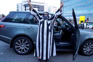 A Newcastle fan celebrates