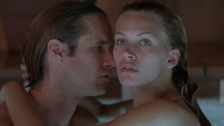 Sil and Robbie naked in a swimming pool in Species