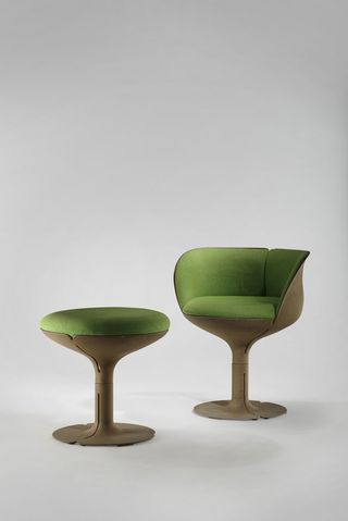 An 'Elysée' chair and footstool.