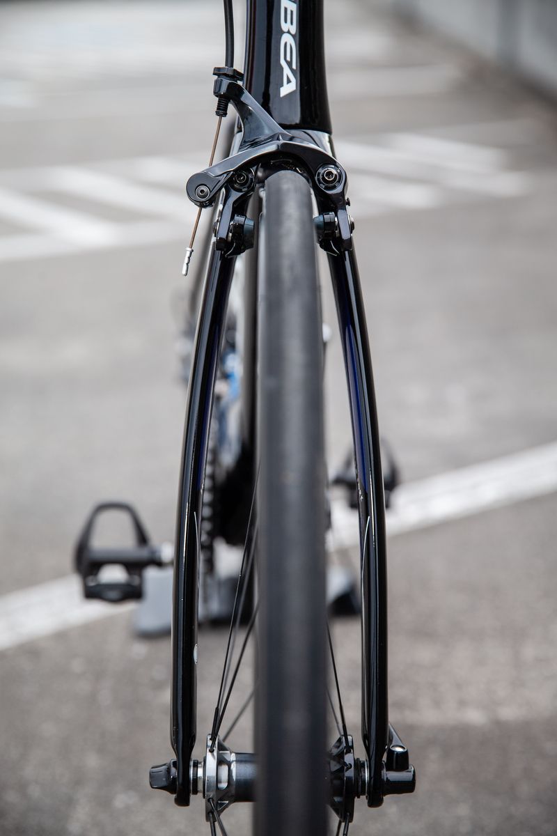 Like many aero framesets, a wide stance forks allows air to flow between the wheel and fork legs, as well as around