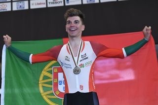 Silver medallist Portugal's Ivo Oliveira poses on the podium after the men's individual pursuit race final during the UCI Track Cycling World Championships