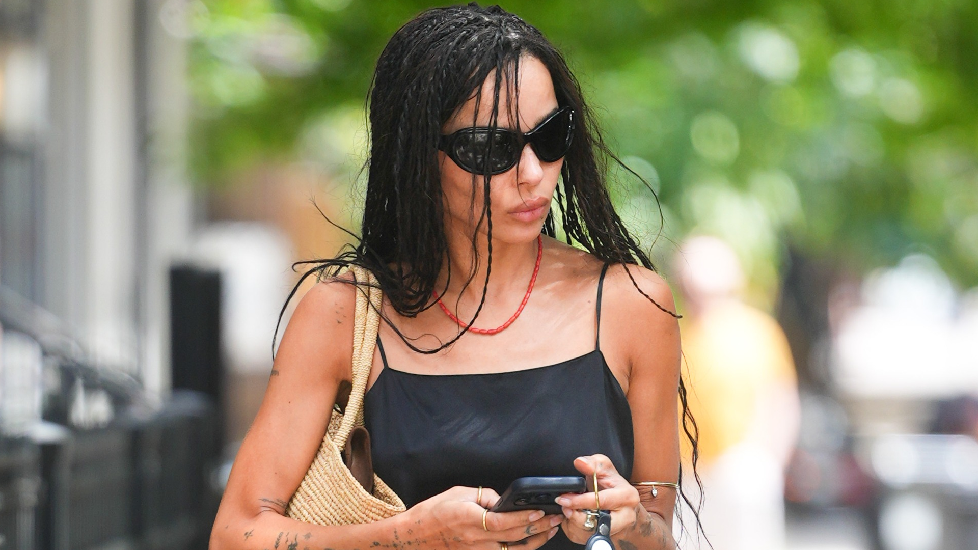 Zo&euml; Kravitz tested the wrong shoe theory in denim shorts, a black camisole, and the mules trend for Fall 2026