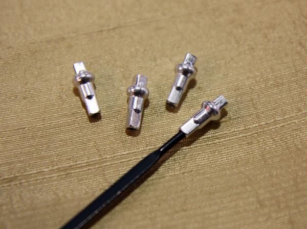 It's the small things that make a difference - American Classic founder Bill Shook designed his own alloy nipples with a deeper counterbore and a matching extension out the back. By extending the spoke through the head, the head is now loaded in shear instead of tension and is far less likely to snap off.