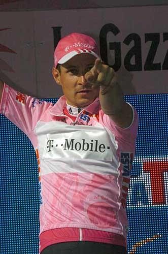 This one's for you! Olaf Pollack salutes from the podium
