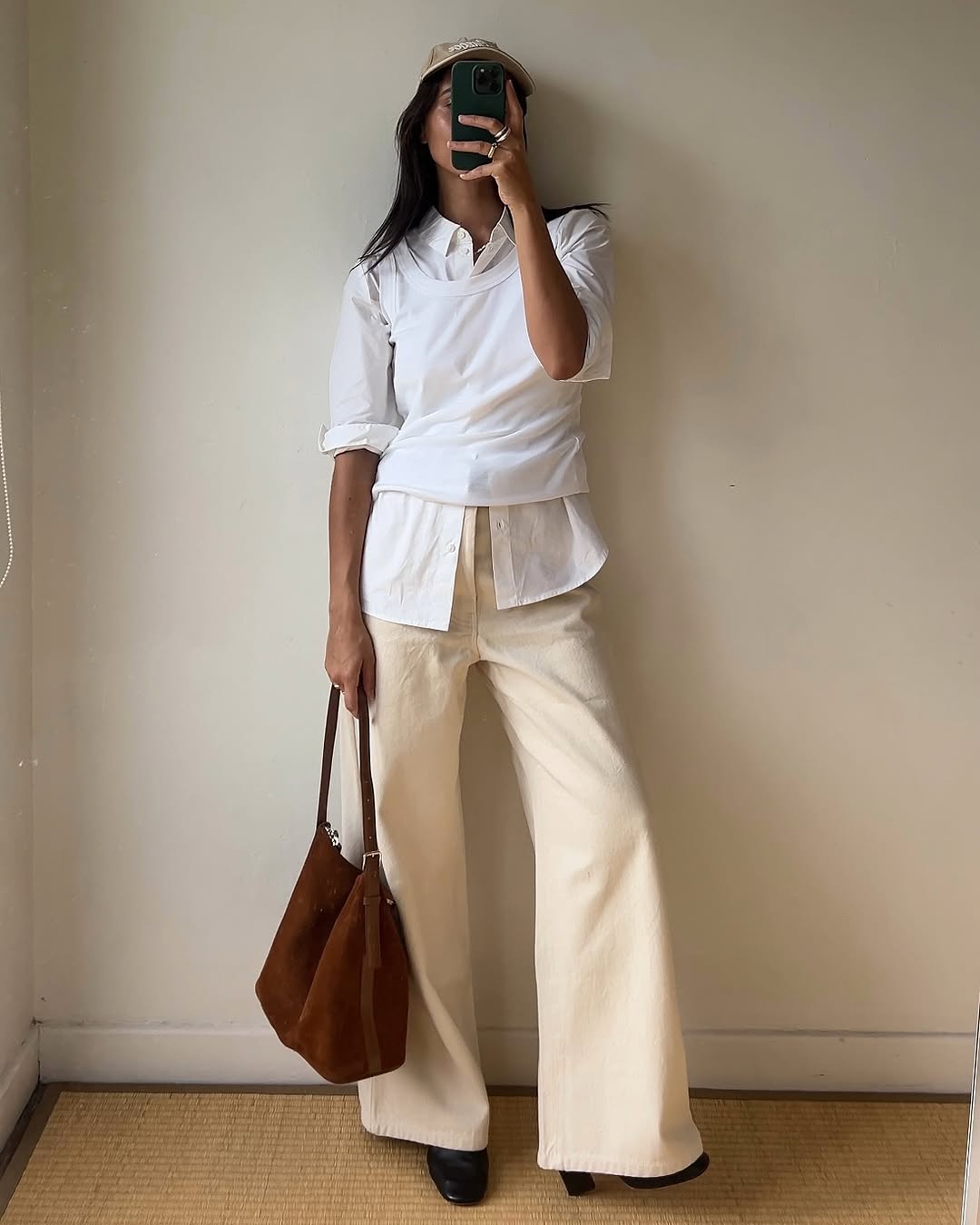 woman wearing early spring outfit idea 2026