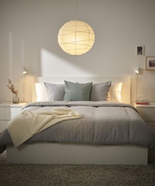 IKEA’s REGOLIT lampshade in a bedroom