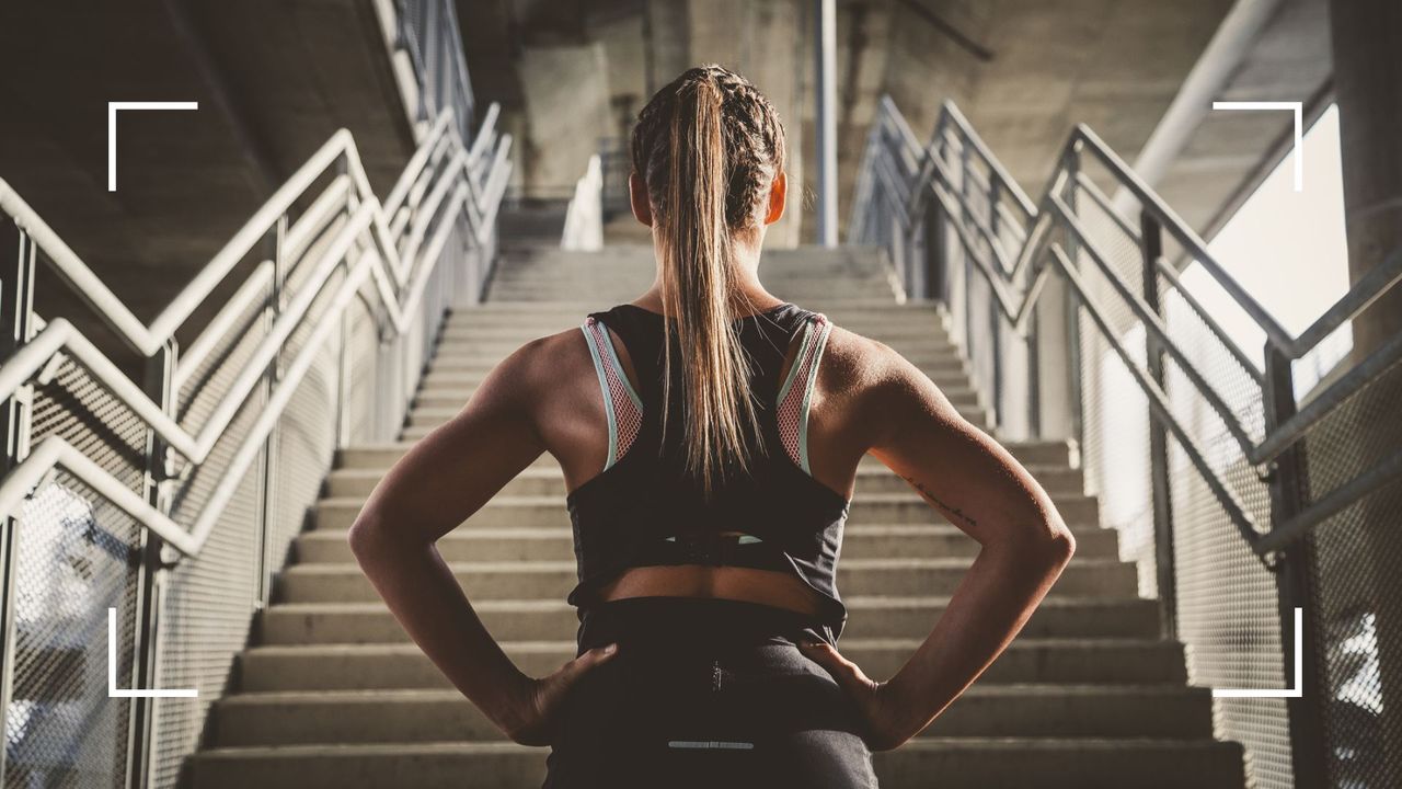 Woman running up stairs