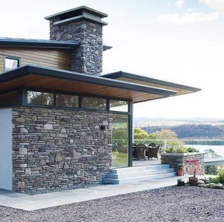 stone clad chimney on contemporary self build home