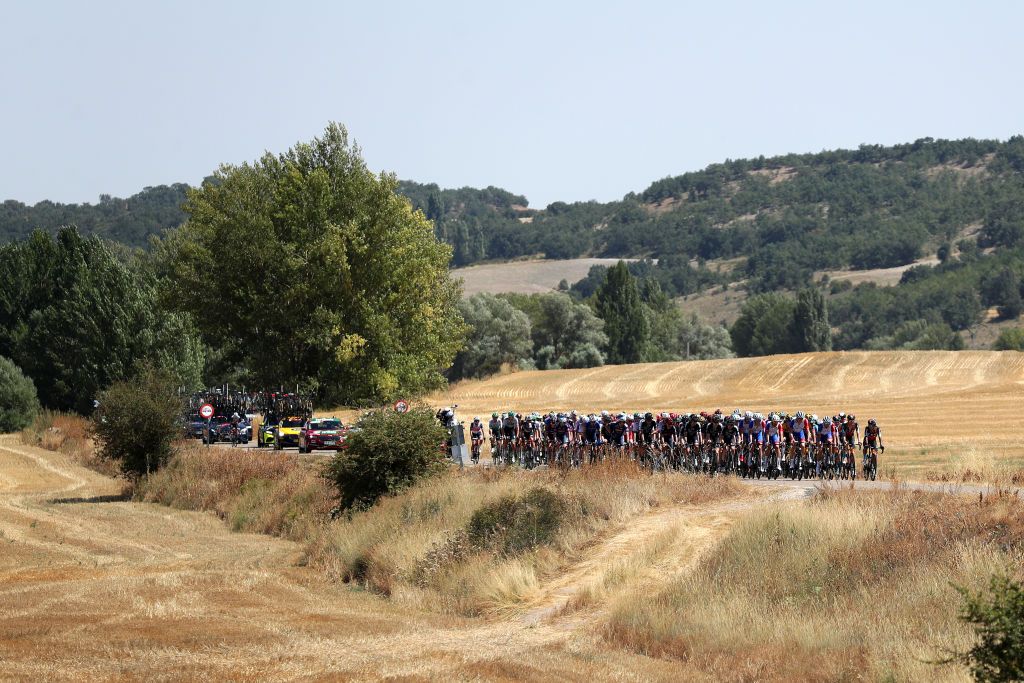 BURGOS SPAIN AUGUST 15 A general view of the peloton during the 76th Tour of Spain 2021 Stage 2 a 1667km stage from Caleruega Monasterio de Santo Domingo de Guzmn to Burgos Gamonal lavuelta LaVuelta21 CapitalMundialdelCiclismo on August 15 2021 in Burgos Spain Photo by Gonzalo Arroyo MorenoGetty Images
