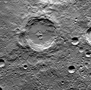 The crater at the center of this image is named Dickens, after Charles Dickens, the English novelist who lived from 1812 to 1870.