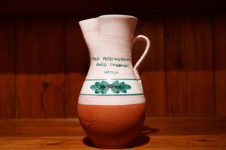 A vase with writing on the front, demonstrating the IBIS of the A7CR.