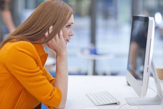 Woman Staring at Computer Screen