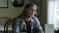 Katee Sackoff's Amanda wearing plaid at a diner in Carrie Episode 7