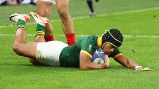 Kurt-Lee Arendse of South Africa scores a diving try to put the Boks in the 2023 Rugby World Cup semi-finals.