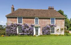 Meltingly beautiful Lodge House in Smeeth, near Ashford, Kent, has a Georgian façade clad in mature wisteria. £2.8 million through Strutt & Parker (01227 808744)