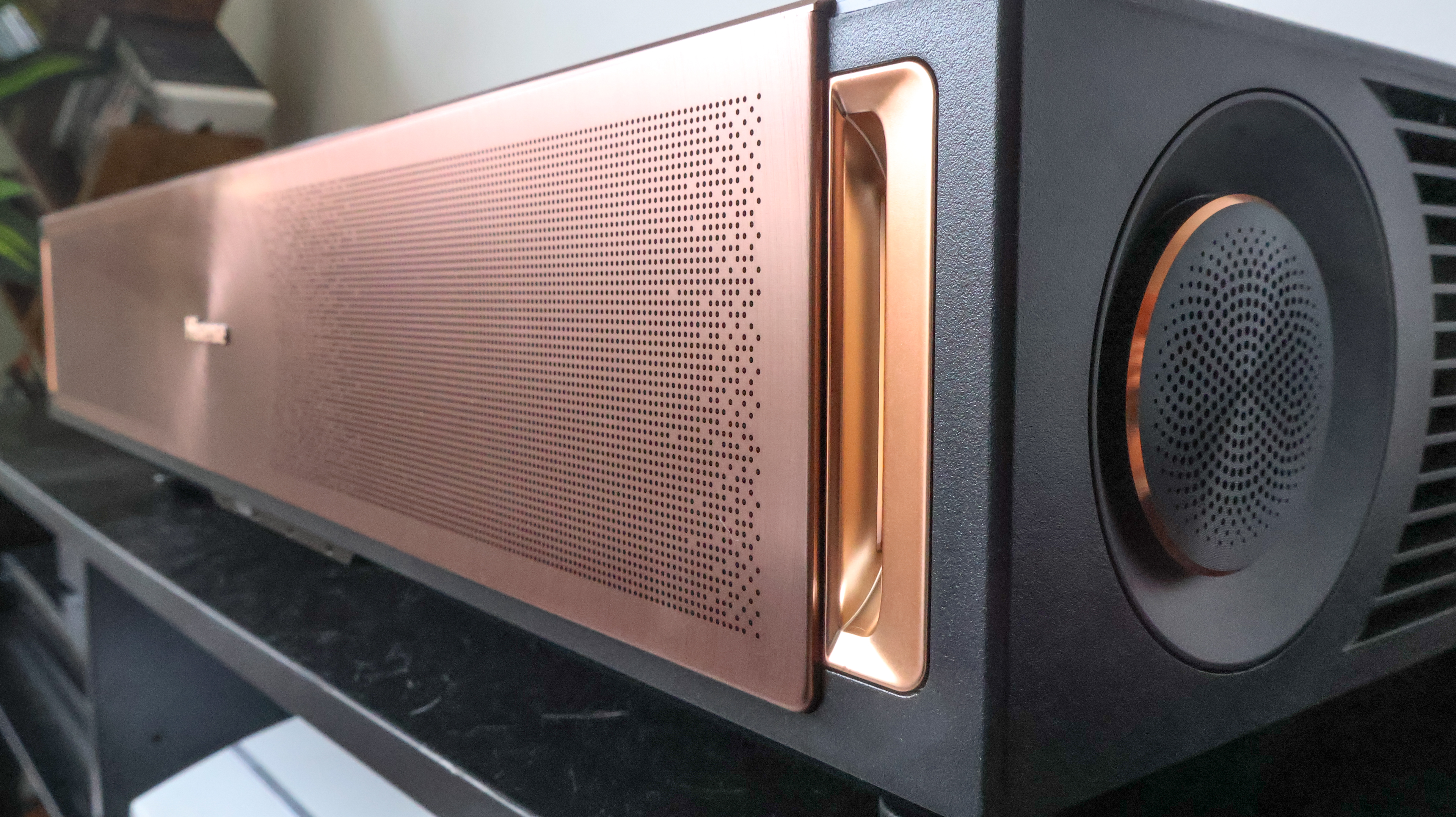 The Hisense L9Q UST projector in a living room