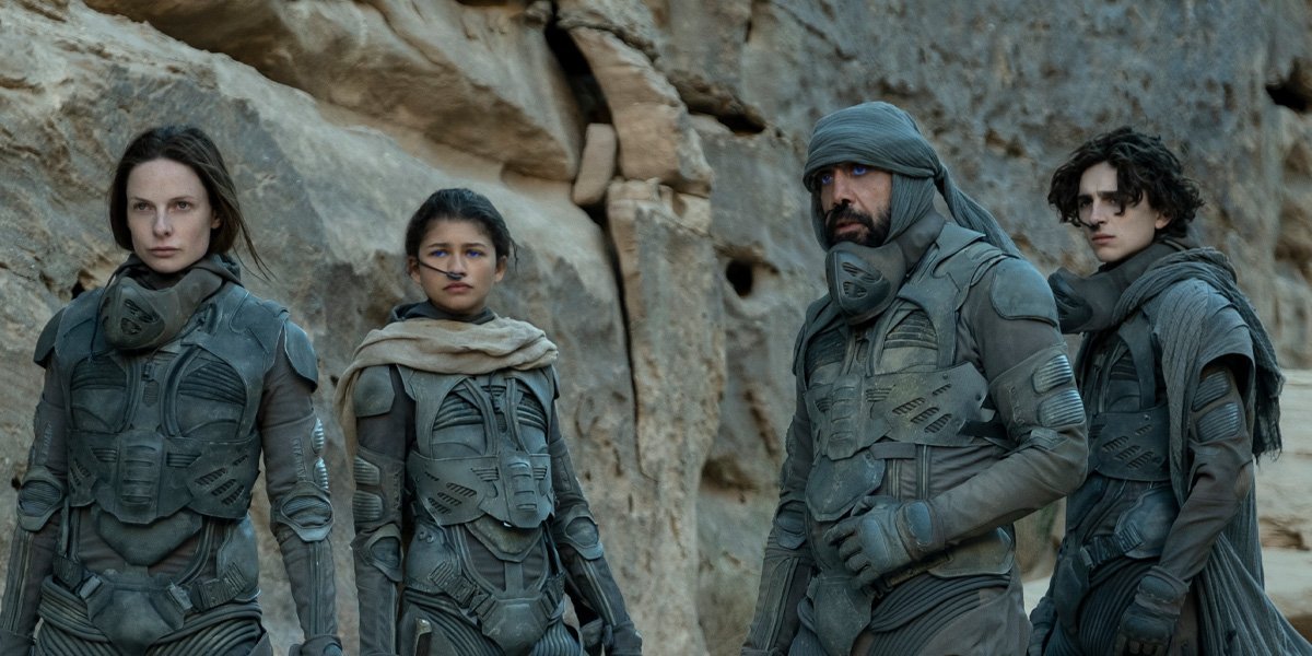 Lady Jessica (Rebecca Ferguson), Chani (Zendaya), Stilgar (Javier Bardem) and Paul Atreides (Timothee Chalamet) stand outside in &#039;Dune&#039;