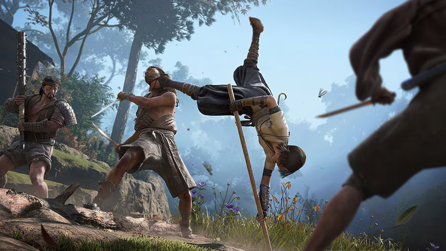 Naoe fights a bunch of guys using her bo staff.